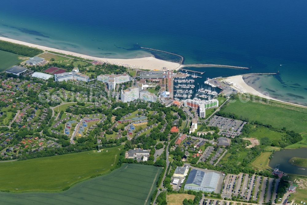 Damp from above - Town view of the streets and houses of the residential areas in Damp with nearby fields at the coastline of the baltic sea in the state Schleswig-Holstein