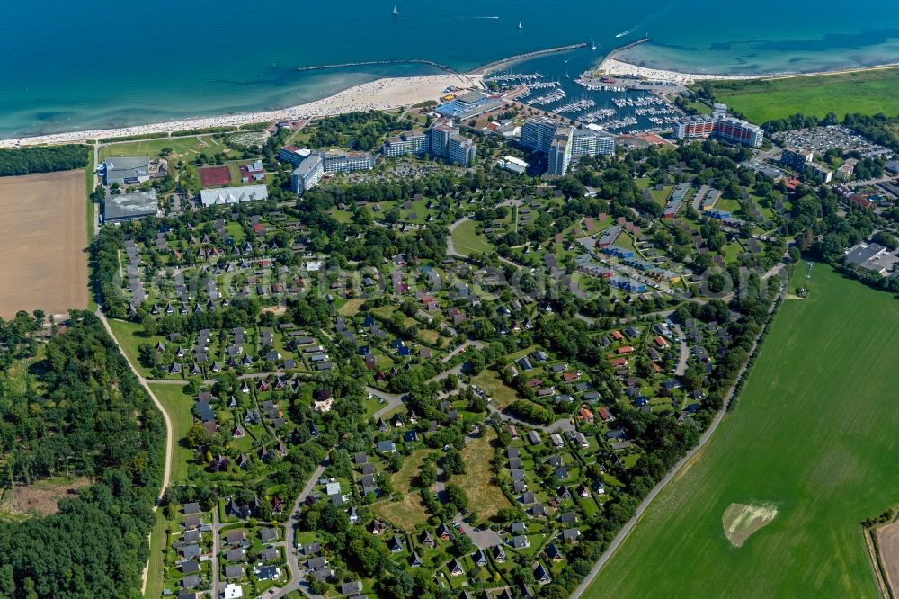 Damp from above - Town view of the streets and houses of the residential areas in Damp with nearby fields at the coastline of the baltic sea in the state Schleswig-Holstein