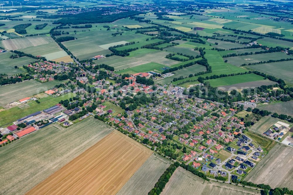 Düdenbüttel from above - Town View of the streets and houses of the residential areas in Duedenbuettel in the state Lower Saxony, Germany