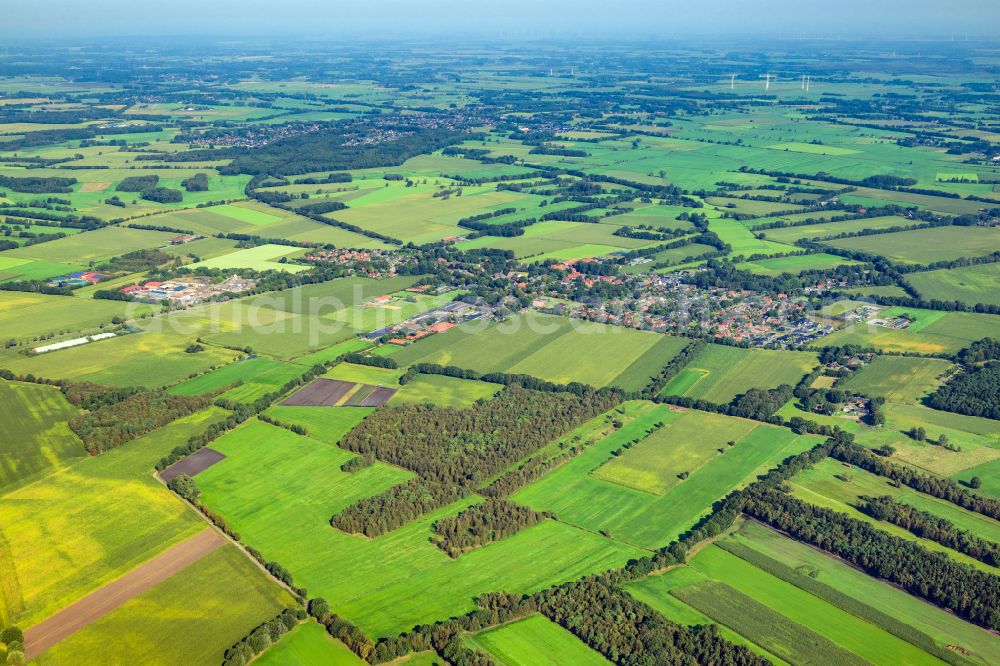 Düdenbüttel from the bird's eye view: Town View of the streets and houses of the residential areas in Duedenbuettel in the state Lower Saxony, Germany