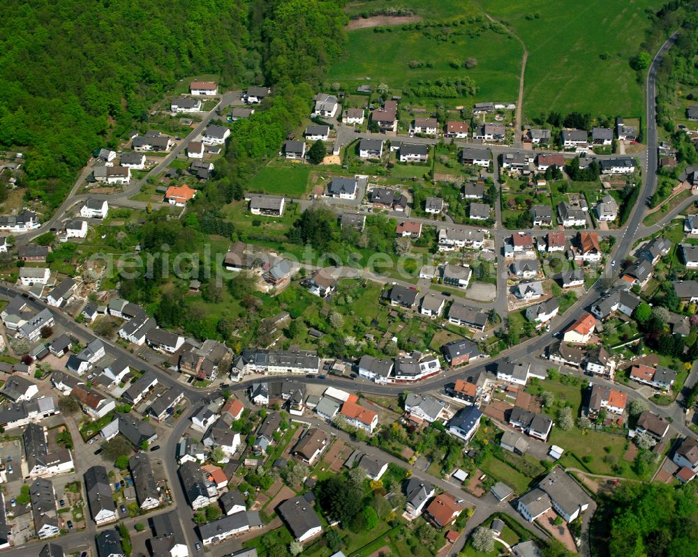 Aerial image Donsbach - Town View of the streets and houses of the residential areas in Donsbach in the state Hesse, Germany