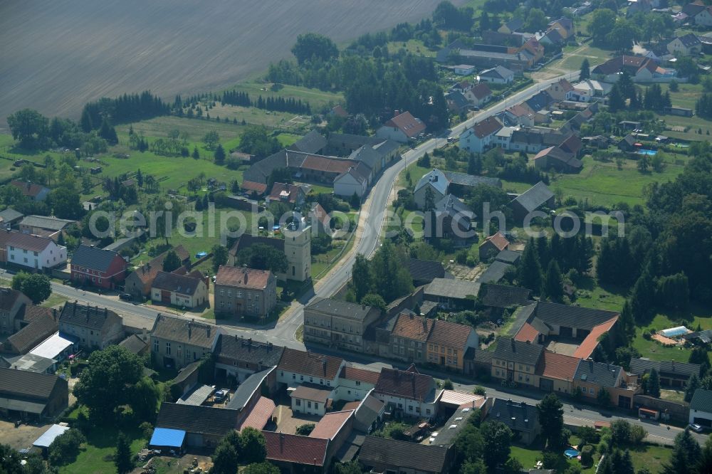 Aerial photograph Stülpe - View of the village of Stuelpe in the state of Brandenburg. The village with its church from the 16th century is located in the county district of Teltow-Flaeming. The county roads L70 and L73 are meeting here