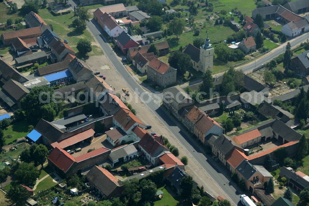 Stülpe from above - View of the village of Stuelpe in the state of Brandenburg. The village with its church from the 16th century is located in the county district of Teltow-Flaeming. The county roads L70 and L73 are meeting here