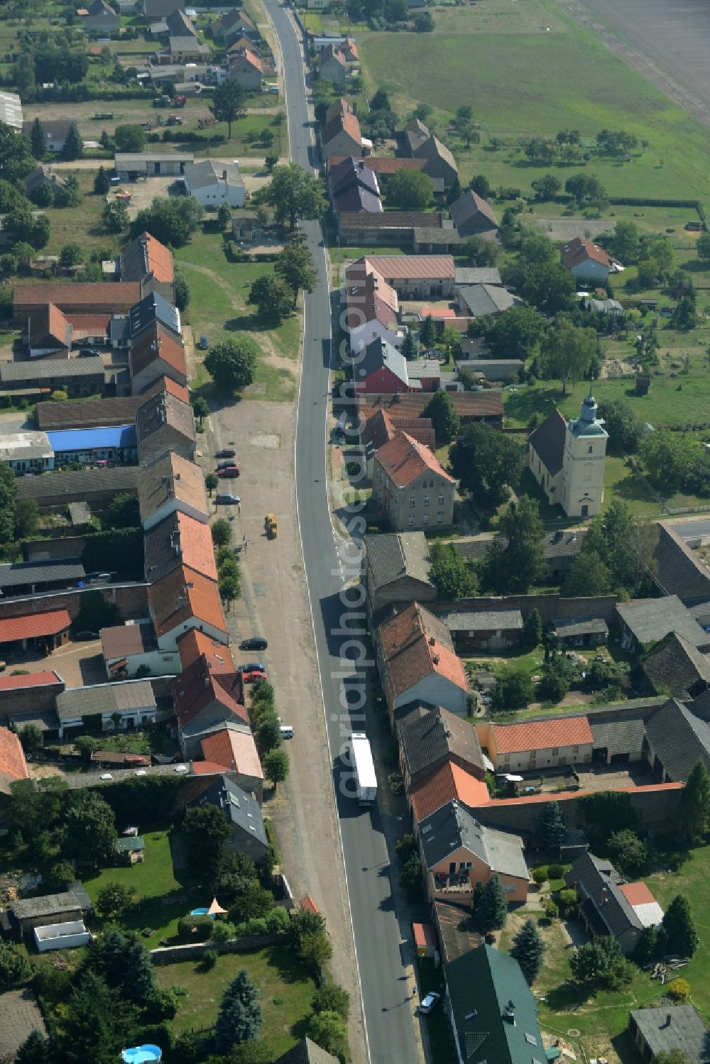 Stülpe from the bird's eye view: View of the village of Stuelpe in the state of Brandenburg. The village with its church from the 16th century is located in the county district of Teltow-Flaeming. The county roads L70 and L73 are meeting here