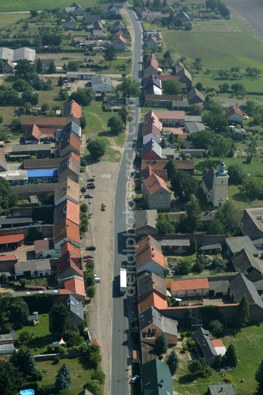 Aerial image Stülpe - View of the village of Stuelpe in the state of Brandenburg. The village with its church from the 16th century is located in the county district of Teltow-Flaeming. The county roads L70 and L73 are meeting here