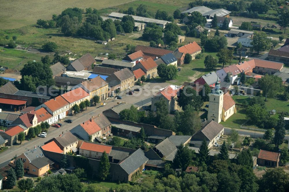 Aerial image Stülpe - View of the village of Stuelpe in the state of Brandenburg. The village with its church from the 16th century is located in the county district of Teltow-Flaeming. The county roads L70 and L73 are meeting here