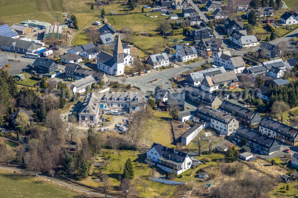 Aerial photograph Andreasberg - Town View of the streets and houses of the residential areas on the village street in Andreasberg in the state North Rhine-Westphalia, Germany