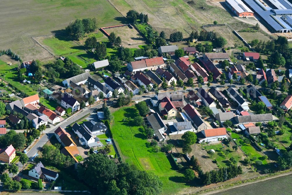 Aerial photograph Tettau - City view of the streets and houses of the residential areas on Dorfstrasse in Tettau in the state Brandenburg, Germany