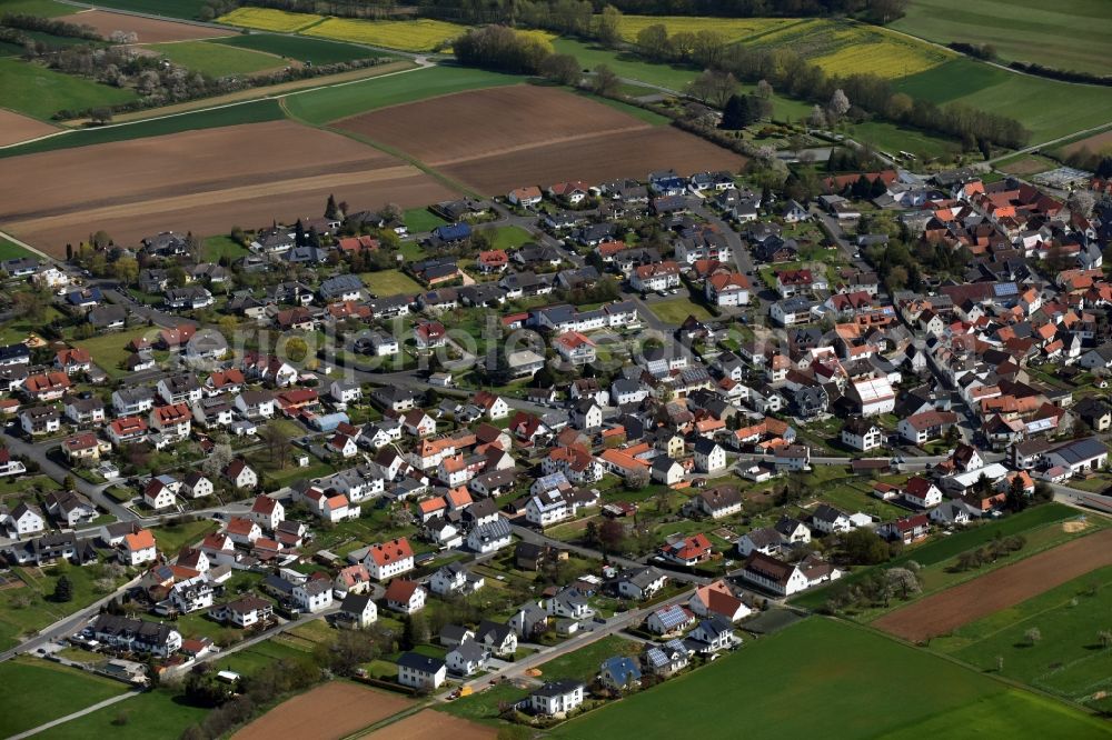 Aerial image Dornholzhausen - Town View of the streets and houses of the residential areas in Dornholzhausen in the state Hesse