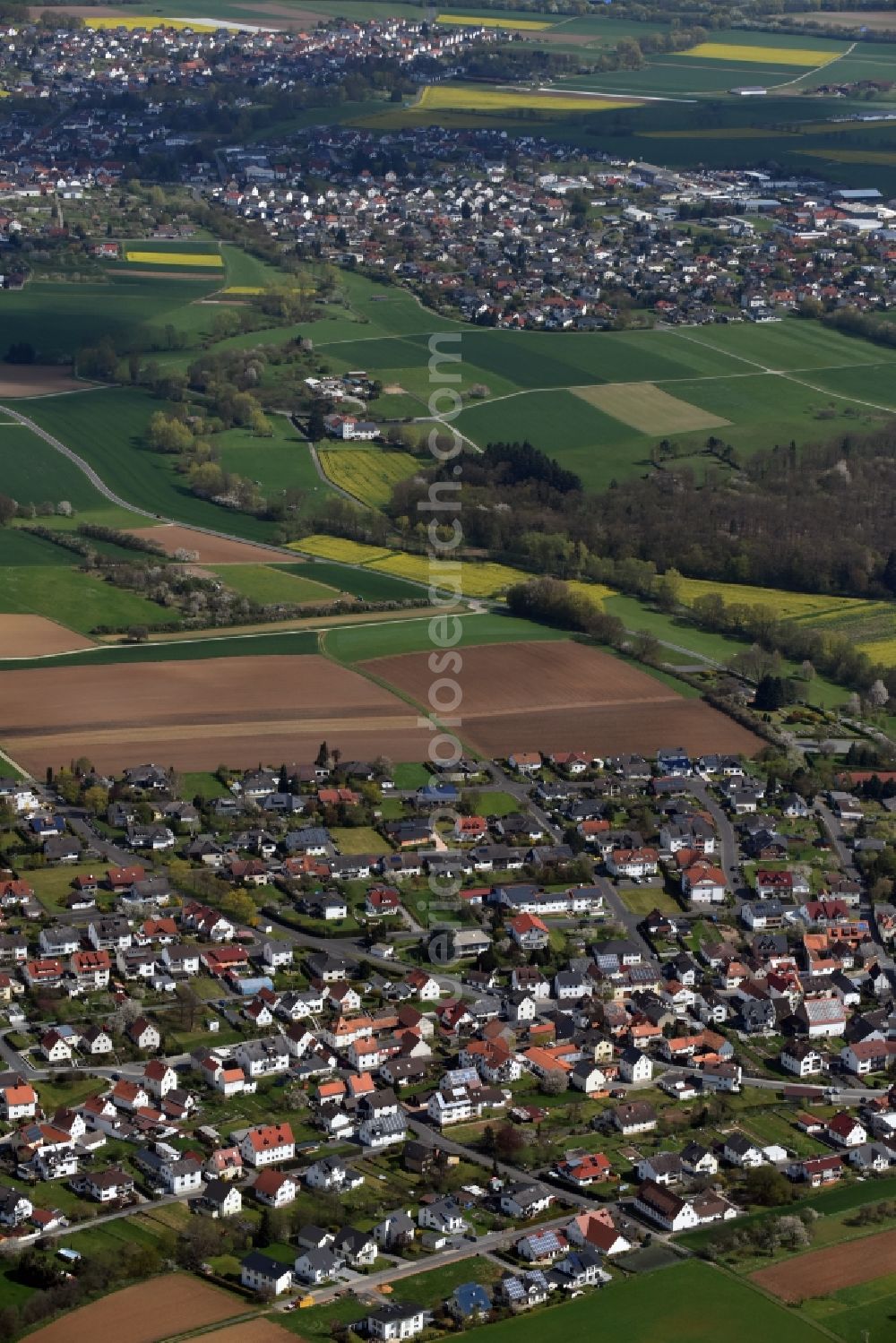 Dornholzhausen from above - Town View of the streets and houses of the residential areas in Dornholzhausen in the state Hesse