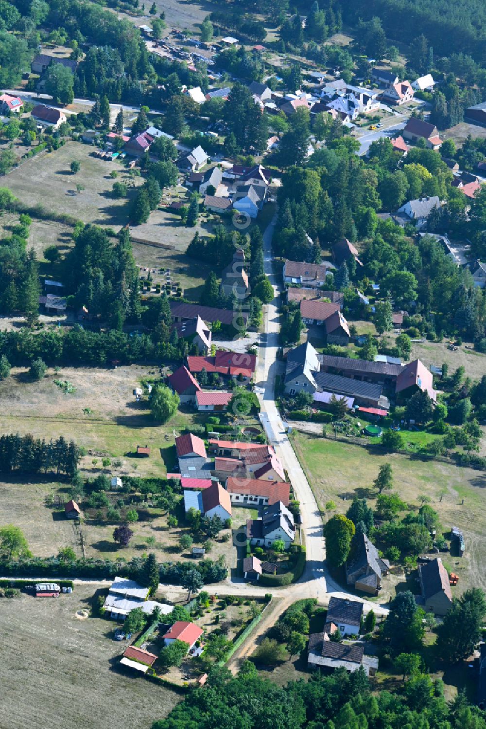 Aerial image Babben - City view of the streets and houses of the residential areas along Dorfstrasse in Babben in the state Brandenburg, Germany