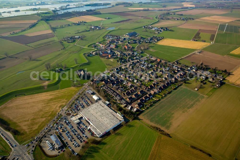 Aerial image Esserden - View of the village of Esserden with a branch of Real convenience stores in the state of North Rhine-Westphalia