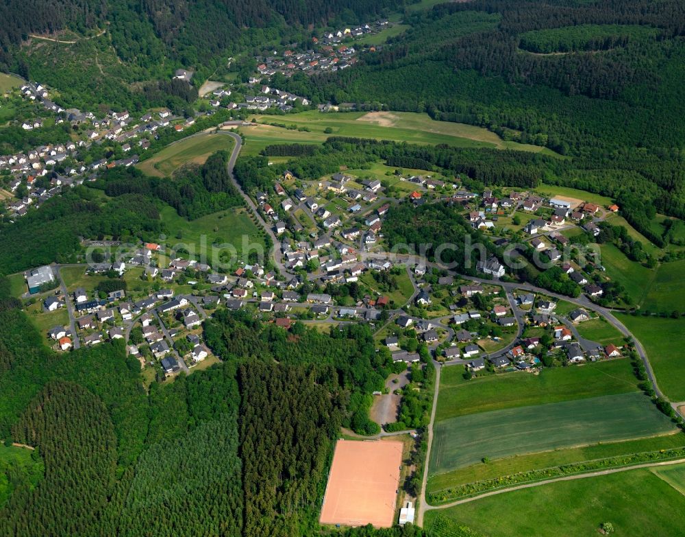 Aerial image Fensdorf - View of Fensdorf in the state of Rhineland-Palatinate. Fensdorf is a borough and municipiality Westerwald Forest region. Its centre consists of residential areas with single family units and semi-detached houses. The borough is surrounded by forest and agricultural land and includes a sports ground and football pitch