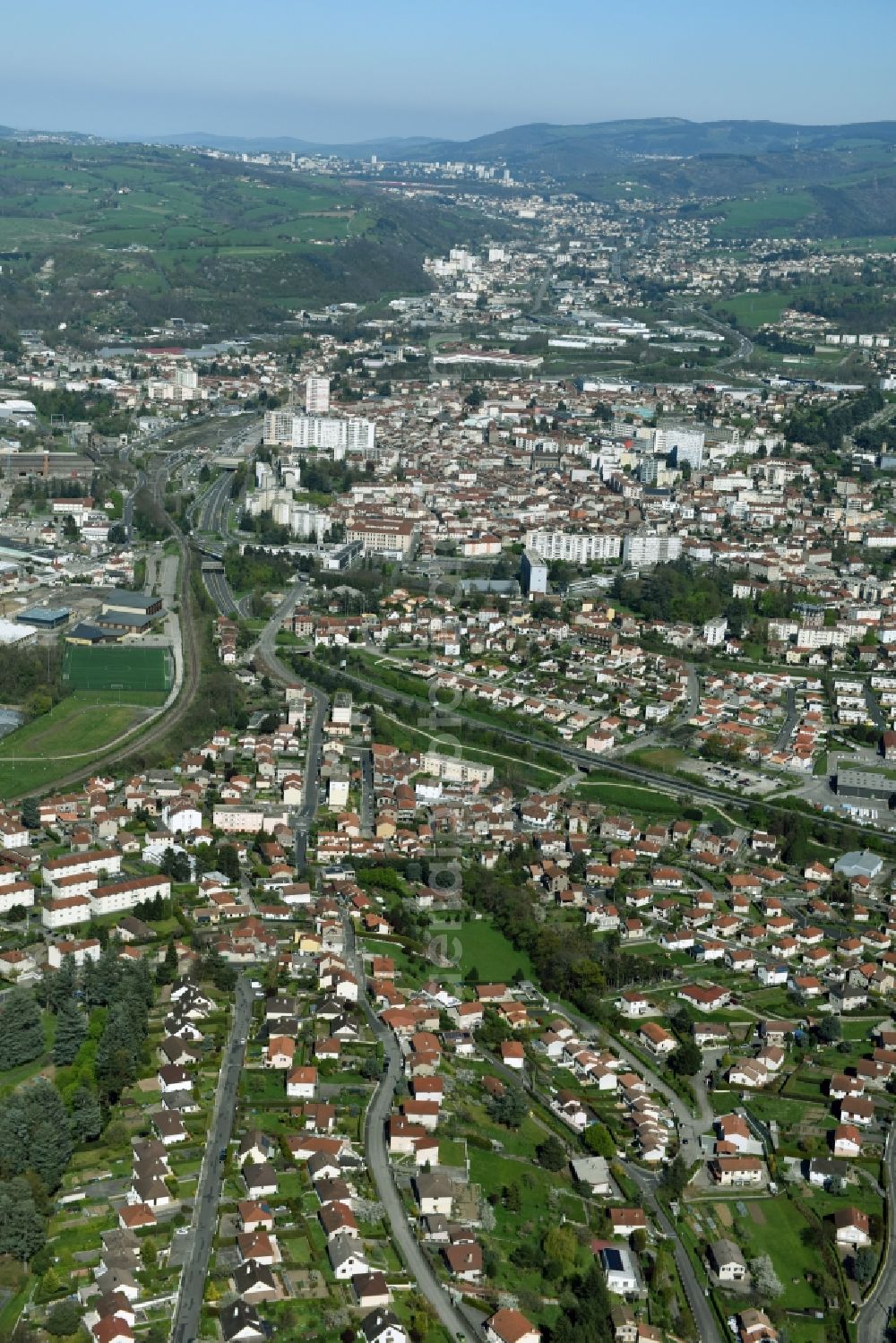 Aerial image Firminy - Town View of the streets and houses of the residential areas in Firminy in Auvergne Rhone-Alpes, France