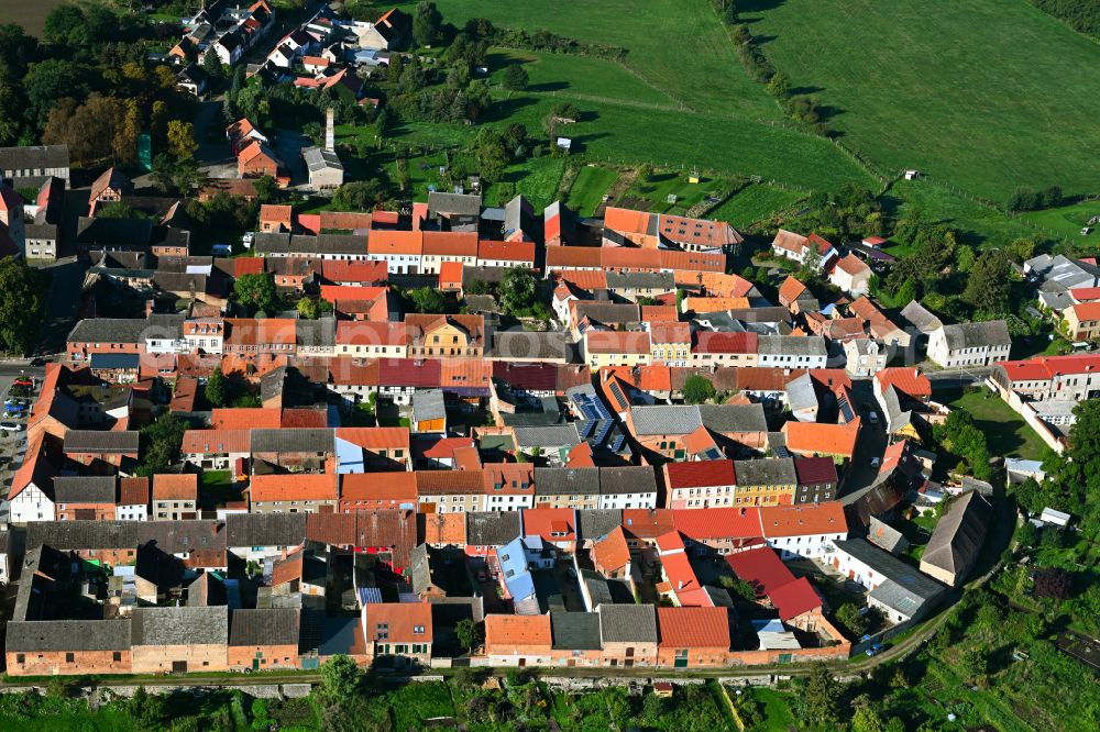 Freyenstein from above - Town View of the streets and houses of the residential areas in Freyenstein in the state Brandenburg, Germany