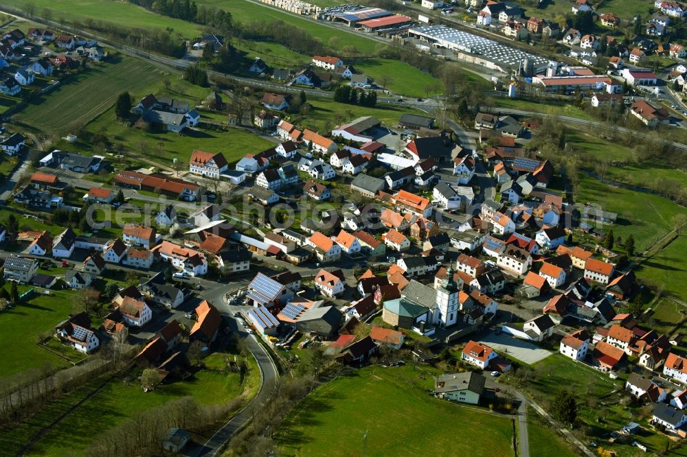 Ebersburg from the bird's eye view: Town View of the streets and houses of the residential areas in Ebersburg in the state Hesse, Germany