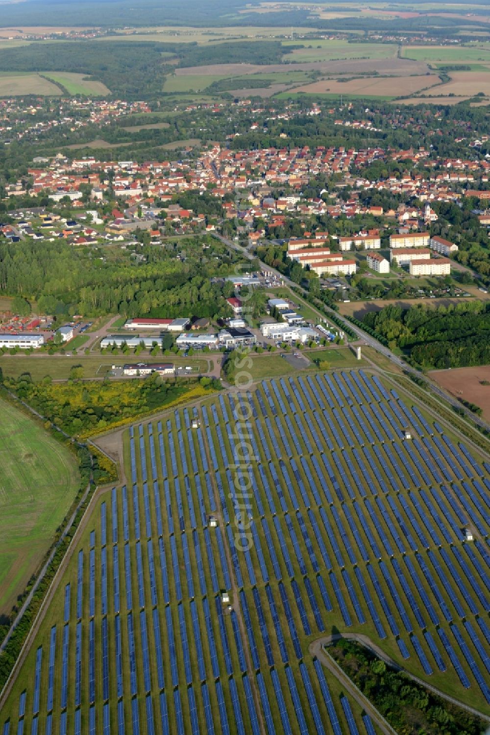 Aerial photograph Helbra - View of the borough of Helbra in the state of Saxony-Anhalt. A solar park is located in the East of Helbra