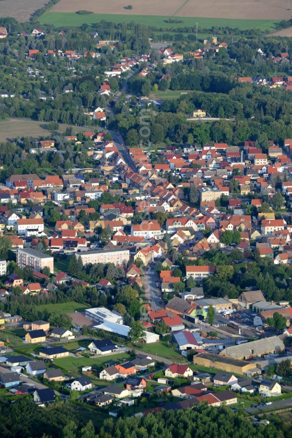 Helbra from above - View of the borough of Helbra in the state of Saxony-Anhalt. A solar park is located in the East of Helbra