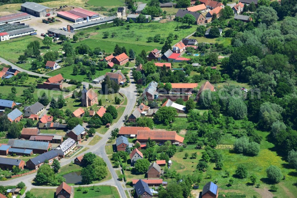 Rühstädt from the bird's eye view: View of the borough of Ruehstaedt in the state of Brandenburg. The village is located in the county district of Prignitz, is characterised by small houses and farms and is surrounded by fields and forest