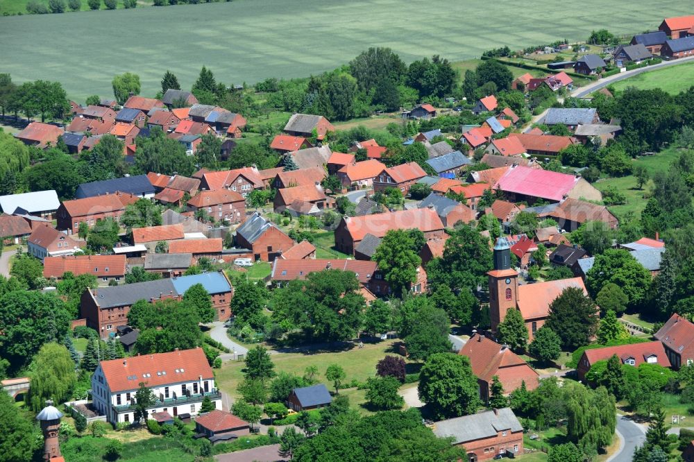 Rühstädt from above - View of the borough of Ruehstaedt in the state of Brandenburg. The village is located in the county district of Prignitz, is characterised by small houses and farms and is surrounded by fields and forest