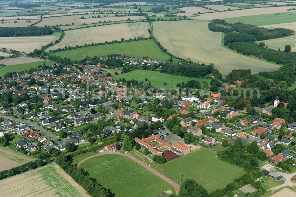 Gülzow from the bird's eye view: Town View of the streets and houses of the residential areas in Guelzow in the state Schleswig-Holstein