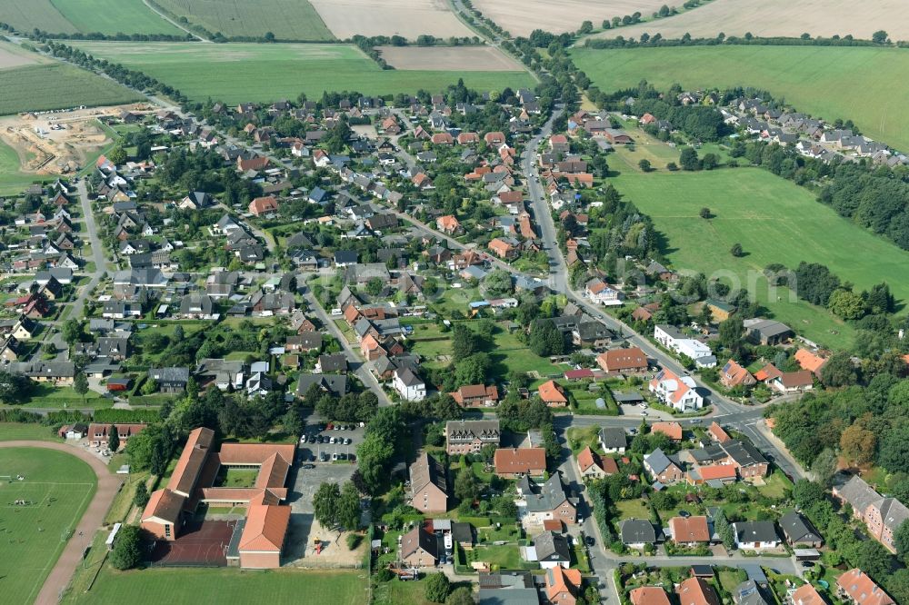 Aerial photograph Gülzow - Town View of the streets and houses of the residential areas in Guelzow in the state Schleswig-Holstein