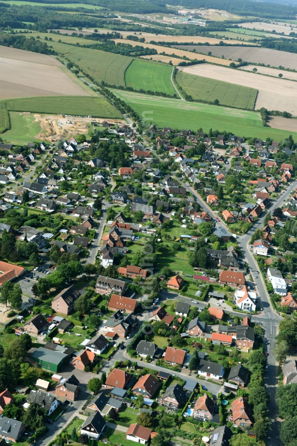 Gülzow from the bird's eye view: Town View of the streets and houses of the residential areas in Guelzow in the state Schleswig-Holstein