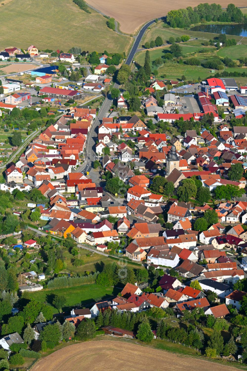 Grabfeld from above - Town View of the streets and houses of the residential areas in Grabfeld in the state Thuringia, Germany