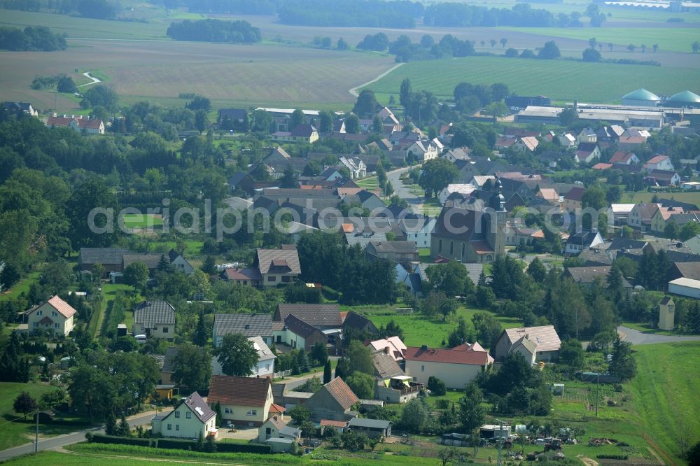 Aerial photograph Grabo - View of Grabo in the state of Saxony-Anhalt. The agricultural village consists of residential buildings and farms and is surrounded by fields