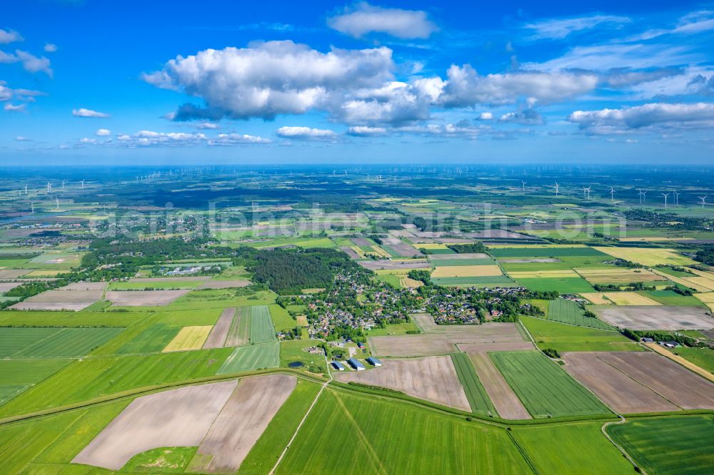 Aerial photograph Humptrup - View of the streets and houses of the residential areas in Grellsbuell in the state Schleswig-Holstein, Germany