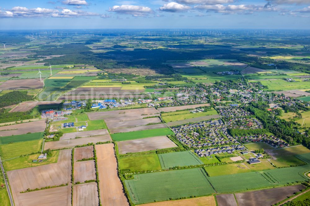 Aerial photograph Humptrup - View of the streets and houses of the residential areas in Grellsbuell in the state Schleswig-Holstein, Germany