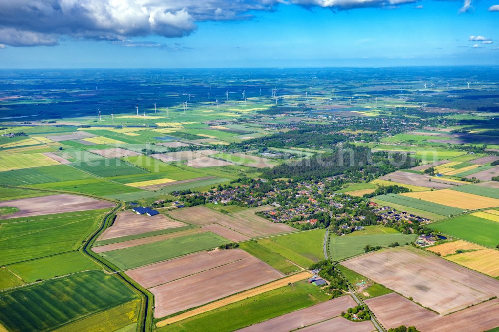 Humptrup from the bird's eye view: View of the streets and houses of the residential areas in Grellsbuell in the state Schleswig-Holstein, Germany