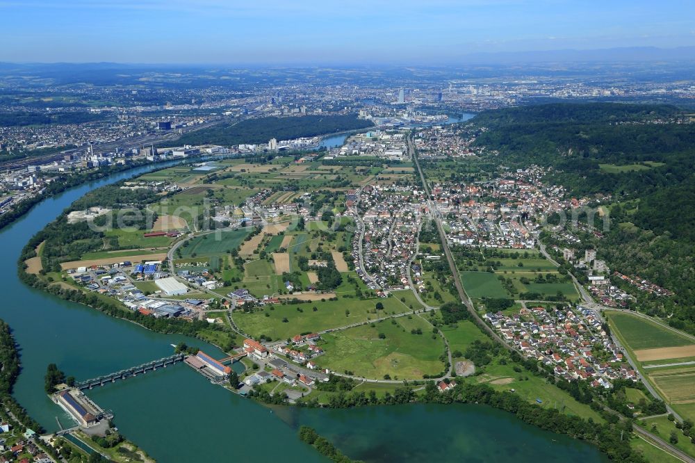 Grenzach-Wyhlen from the bird's eye view: Town view of the two districts Grenzach and Wyhlen in Grenzach-Wyhlen at the Rhine river in the state Baden-Wurttemberg, Germany. In the Background the city of Basle in Switzerland