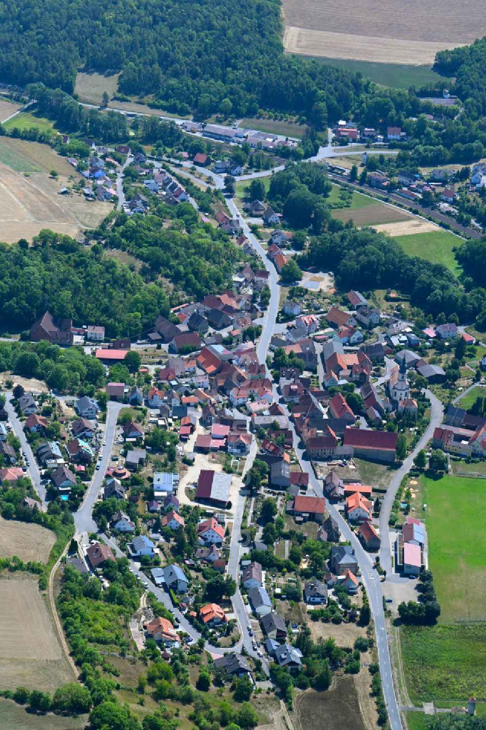 Grünsfeld from the bird's eye view: Town View of the streets and houses of the residential areas in Grünsfeld in the state Baden-Wuerttemberg, Germany