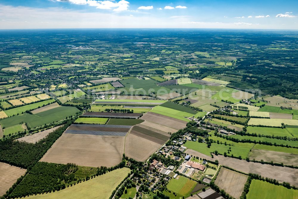 Aerial photograph Hartenholm - Town View of the streets and houses of the residential areas in Hartenholm in the state Schleswig-Holstein, Germany