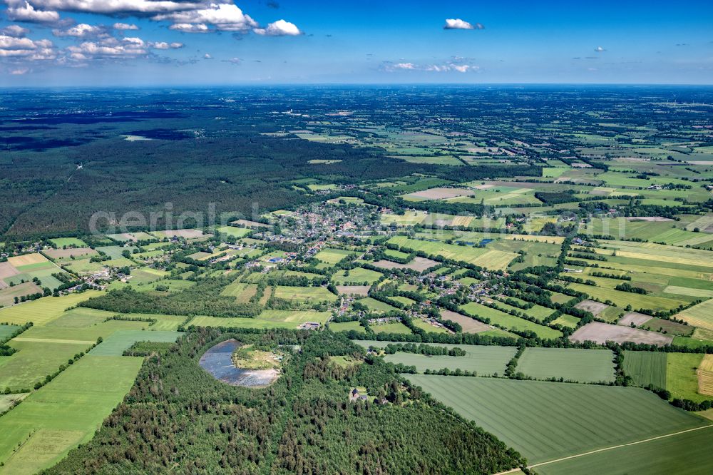 Aerial photograph Hartenholm - Town View of the streets and houses of the residential areas in Hartenholm in the state Schleswig-Holstein, Germany