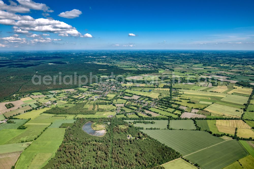 Hartenholm from above - Town View of the streets and houses of the residential areas in Hartenholm in the state Schleswig-Holstein, Germany