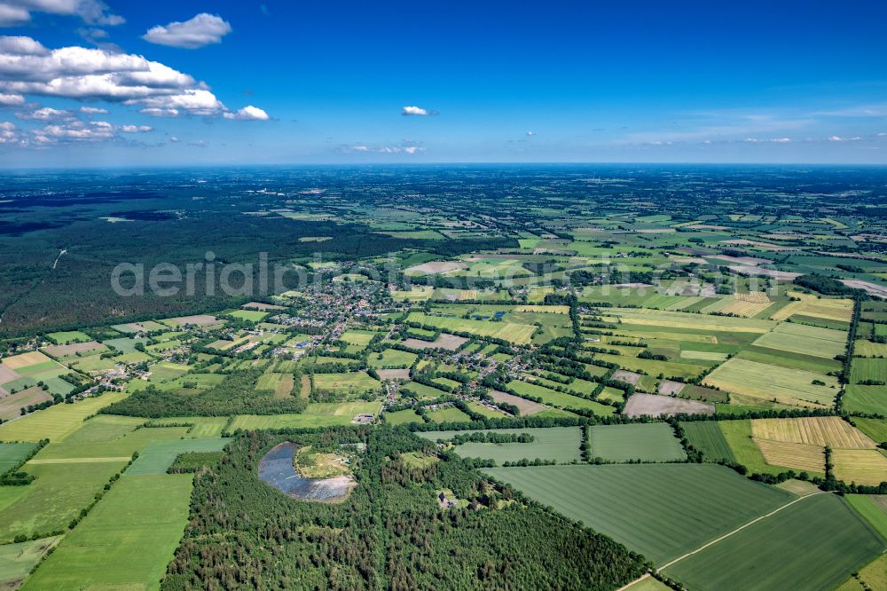 Hartenholm from the bird's eye view: Town View of the streets and houses of the residential areas in Hartenholm in the state Schleswig-Holstein, Germany