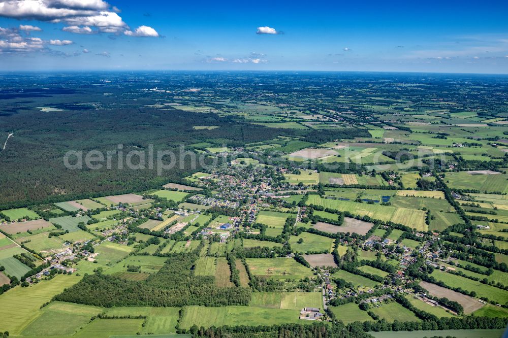 Aerial image Hartenholm - Town View of the streets and houses of the residential areas in Hartenholm in the state Schleswig-Holstein, Germany