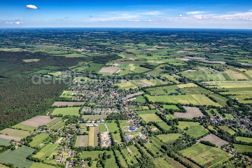 Aerial image Hartenholm - Town View of the streets and houses of the residential areas in Hartenholm in the state Schleswig-Holstein, Germany