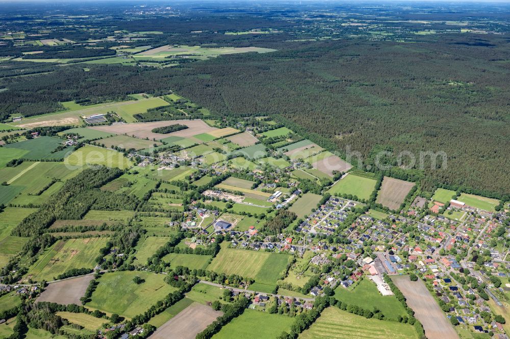 Hartenholm from above - Town View of the streets and houses of the residential areas in Hartenholm in the state Schleswig-Holstein, Germany