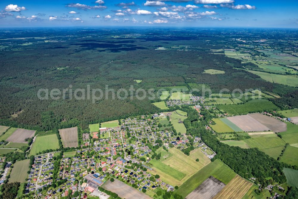 Aerial image Hartenholm - Town View of the streets and houses of the residential areas in Hartenholm in the state Schleswig-Holstein, Germany