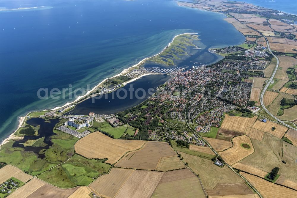 Heiligenhafen from the bird's eye view: Town View of the streets and houses of the residential areas of the field seamed town Heiligenhafen at the coast of the Baltic Sea in the state Schleswig-Holstein