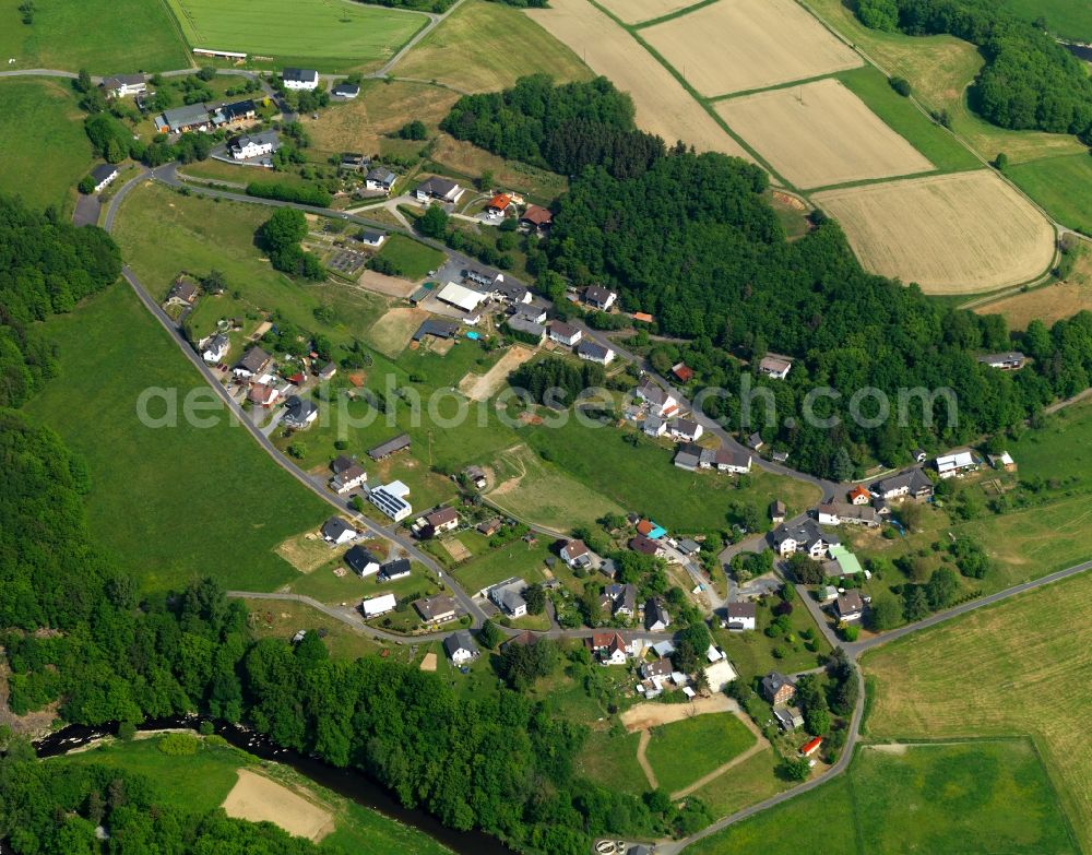 Helmeroth from above - View of Helmeroth in the state of Rhineland-Palatinate. Helmeroth is a borough and municipiality Westerwald Forest region. Its centre consists of residential areas with single family units and semi-detached houses. The borough is surrounded by forest and agricultural land