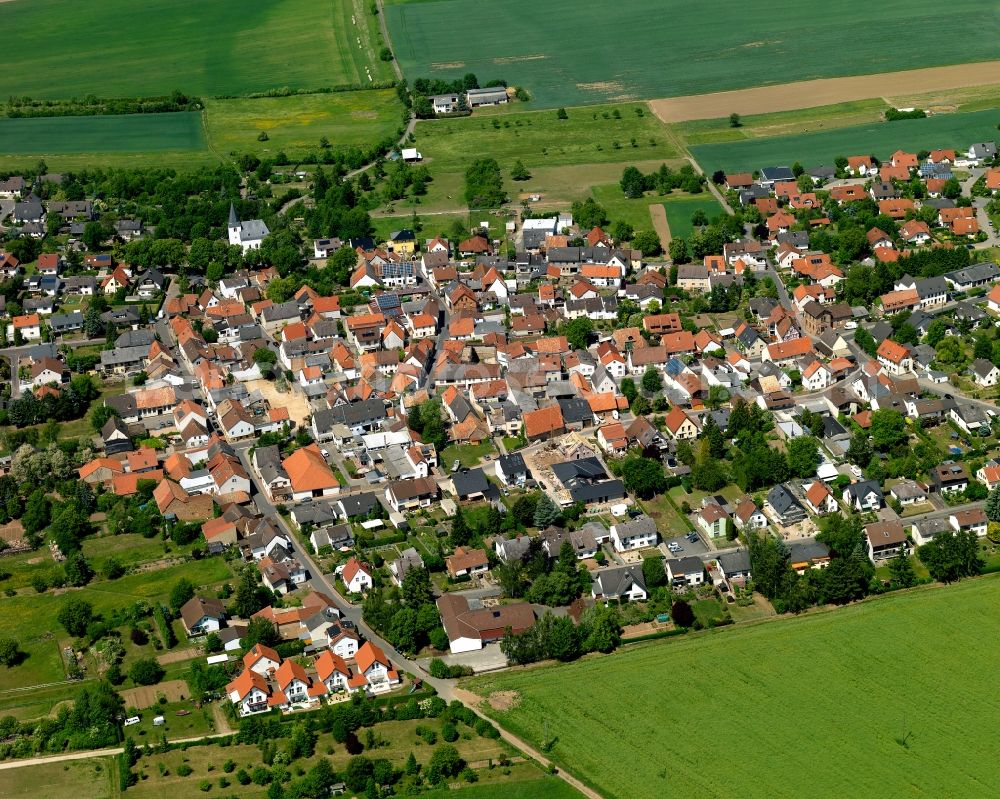 Aerial image Hüffelsheim - View of the borough of Hueffelsheim in the state of Rhineland-Palatinate. The municipiality is located above the Nahe Valley on a plateau near the Nature Park Soonwald-Nahe. It includes several settlements and residential areas and agricultural land