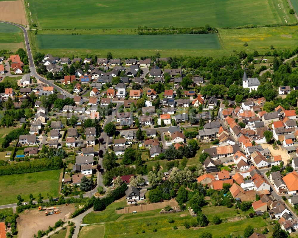 Aerial photograph Hüffelsheim - View of the borough of Hueffelsheim in the state of Rhineland-Palatinate. The municipiality is located above the Nahe Valley on a plateau near the Nature Park Soonwald-Nahe. It includes several settlements and residential areas and agricultural land