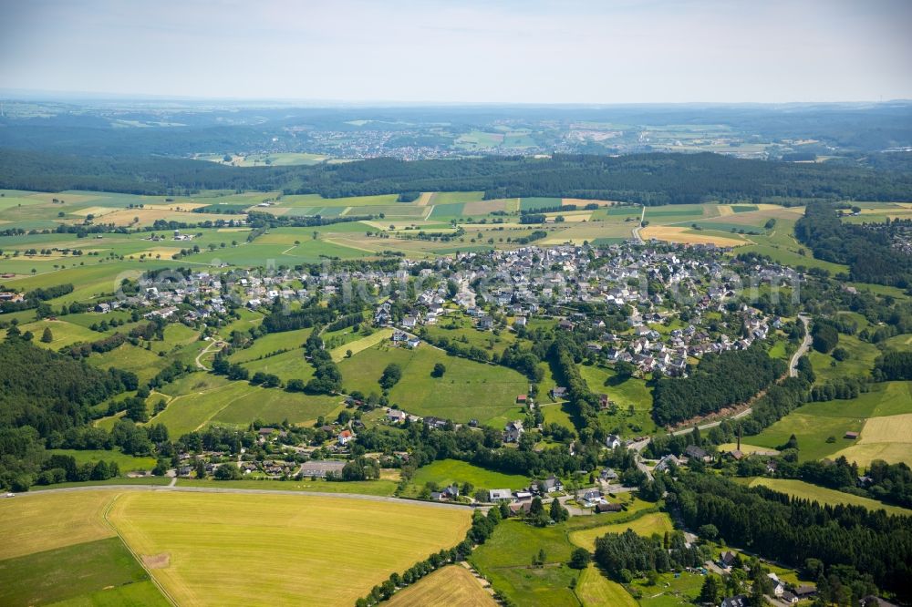 Aerial image Hirschberg - Town View of the streets and houses of the residential areas in Hirschberg in the state North Rhine-Westphalia