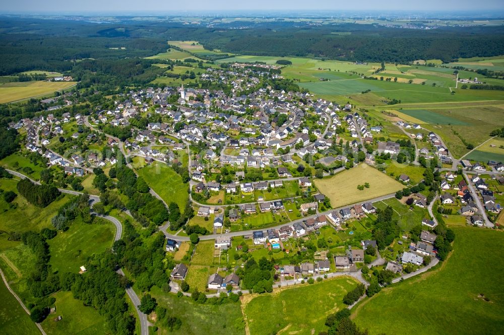 Hirschberg from the bird's eye view: Town View of the streets and houses of the residential areas in Hirschberg in the state North Rhine-Westphalia