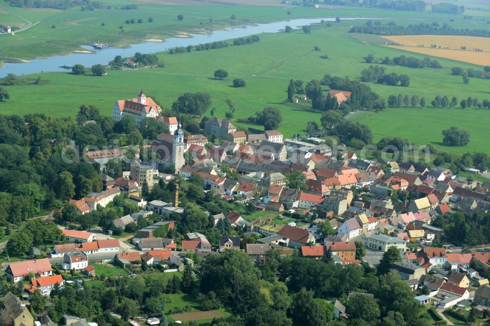 Pretzsch (Elbe) from the bird's eye view: View of the historic centre of Pretzsch (Elbe) in the state of Saxony-Anhalt. Pretzsch is known for its renaissance castle with the garden, the castle district with the historic buildings and the gothic church. The river Elbe runs in the background