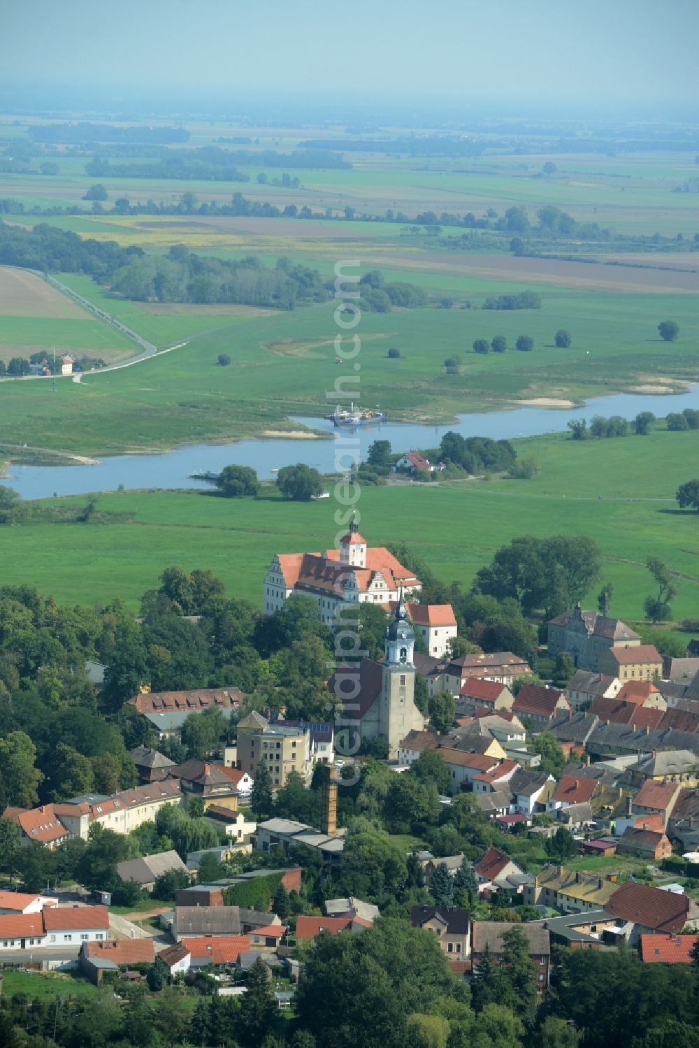 Aerial image Pretzsch (Elbe) - View of the historic centre of Pretzsch (Elbe) in the state of Saxony-Anhalt. Pretzsch is known for its renaissance castle with the garden, the castle district with the historic buildings and the gothic church. The river Elbe runs in the background